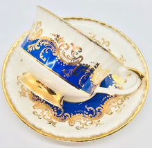 Load image into Gallery viewer, SOLD! Pretty in Pink-And Cobalt-Paragon Royal Warrant Pedestal Teacup and Saucer
