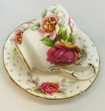 Load image into Gallery viewer, Pretty in Pink-White Paragon Golden Emblem Pedestal Teacup and Saucer