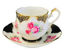 Load image into Gallery viewer, Shafford Japan Black and Gold with Pink Roses Teacup and Saucer
